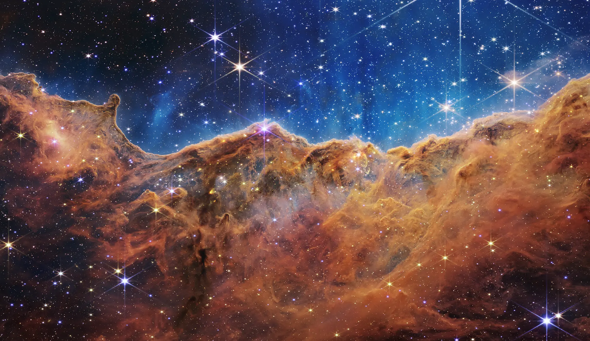 Cosmic Cliffs in the Carina Nebula captured by JWST